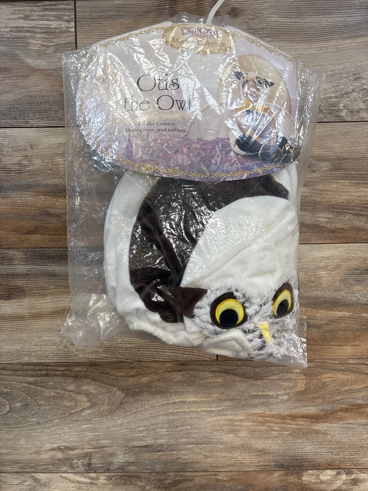 Otis the Owl toddler costume, white and brown plush with yellow eyes, packaged for kids' dress-up or Halloween.