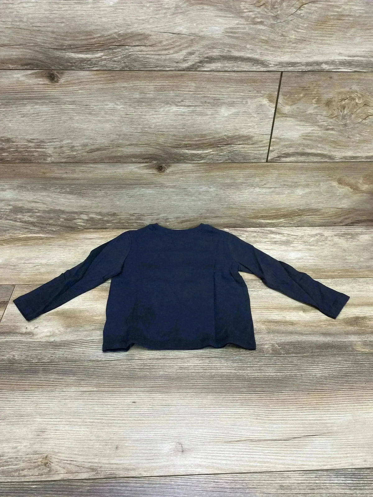 Back view of Old Navy Dream Builder 2T charcoal long-sleeve shirt showing crew neckline on wood floor