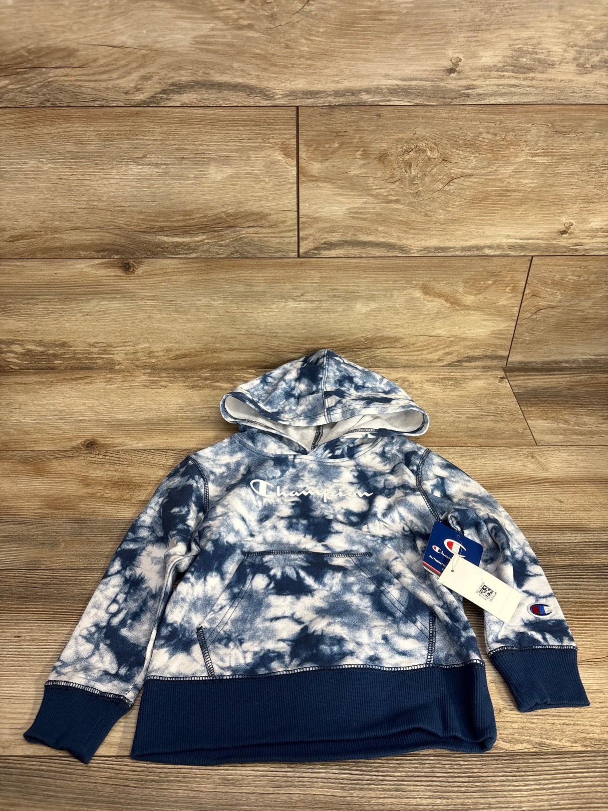 Kids blue and white tie-dye Champion hoodie with front pocket and tags