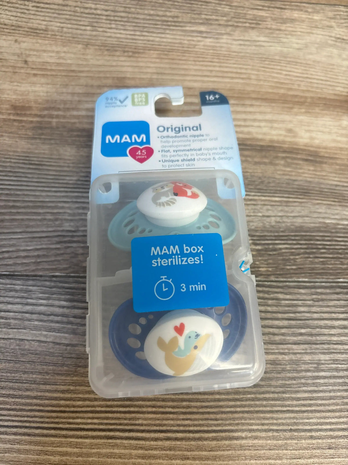 MAM Original pacifier set in blue with animal designs, BPA-free, in sterilizing case