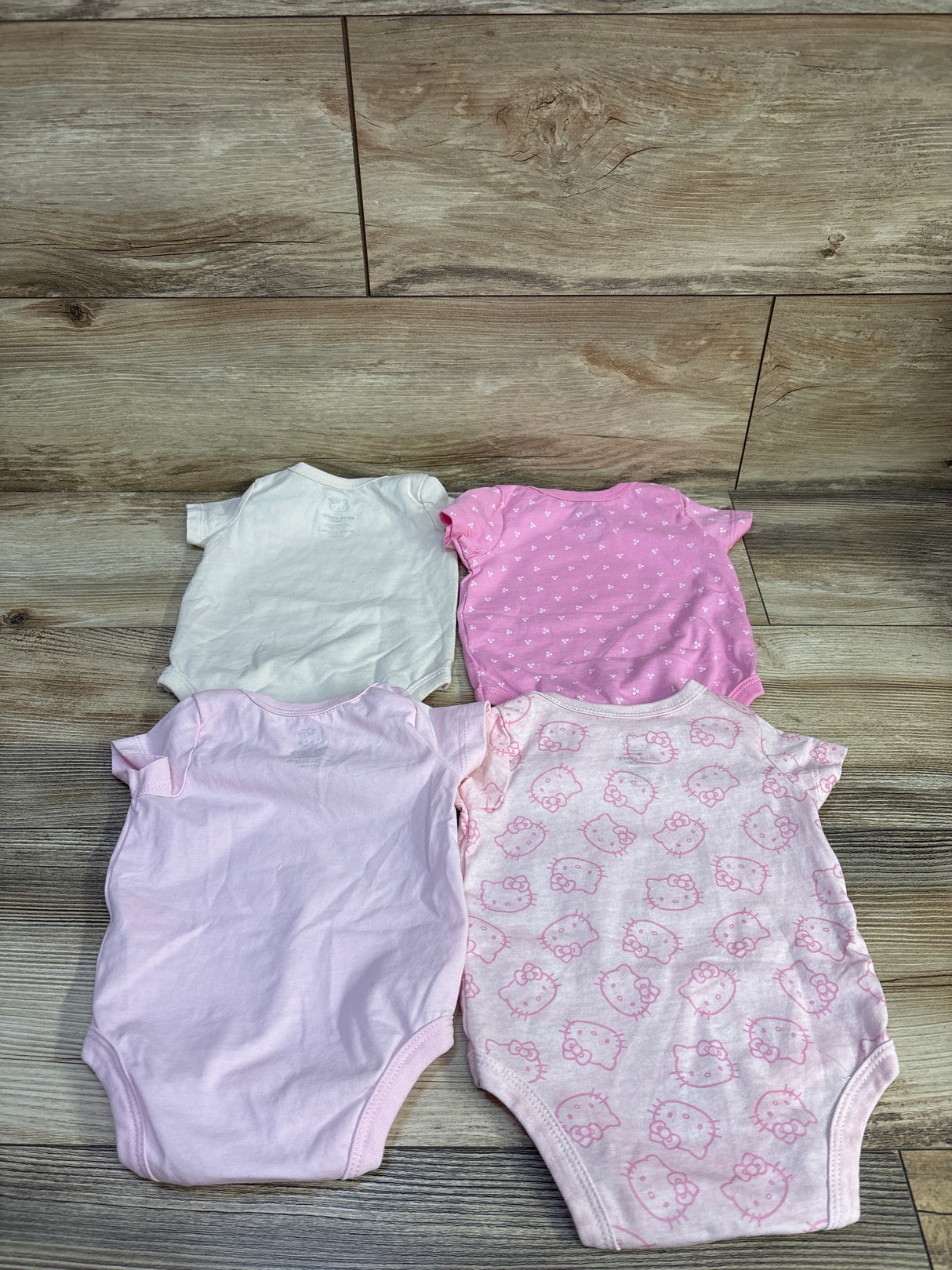 Hello Kitty 4pk Bodysuits Pink sz 3/6m