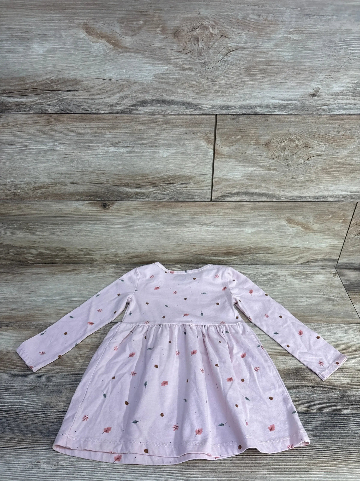 Front view of pink Carter’s long-sleeve toddler dress showcasing long sleeves and flared skirt on white background