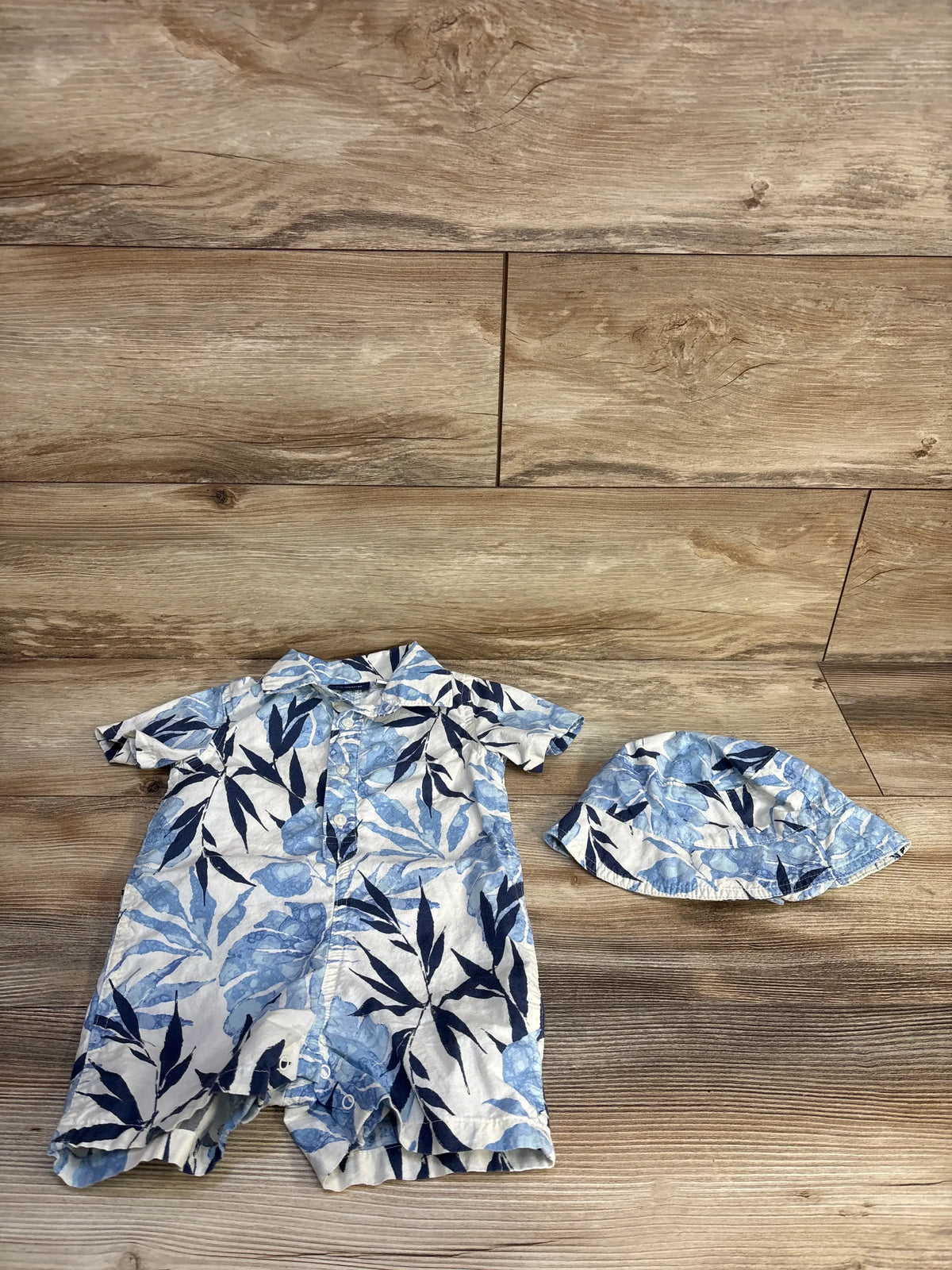 Children's Place 2pc Tropical Polo Romper & Hat Set in white and blue floral print