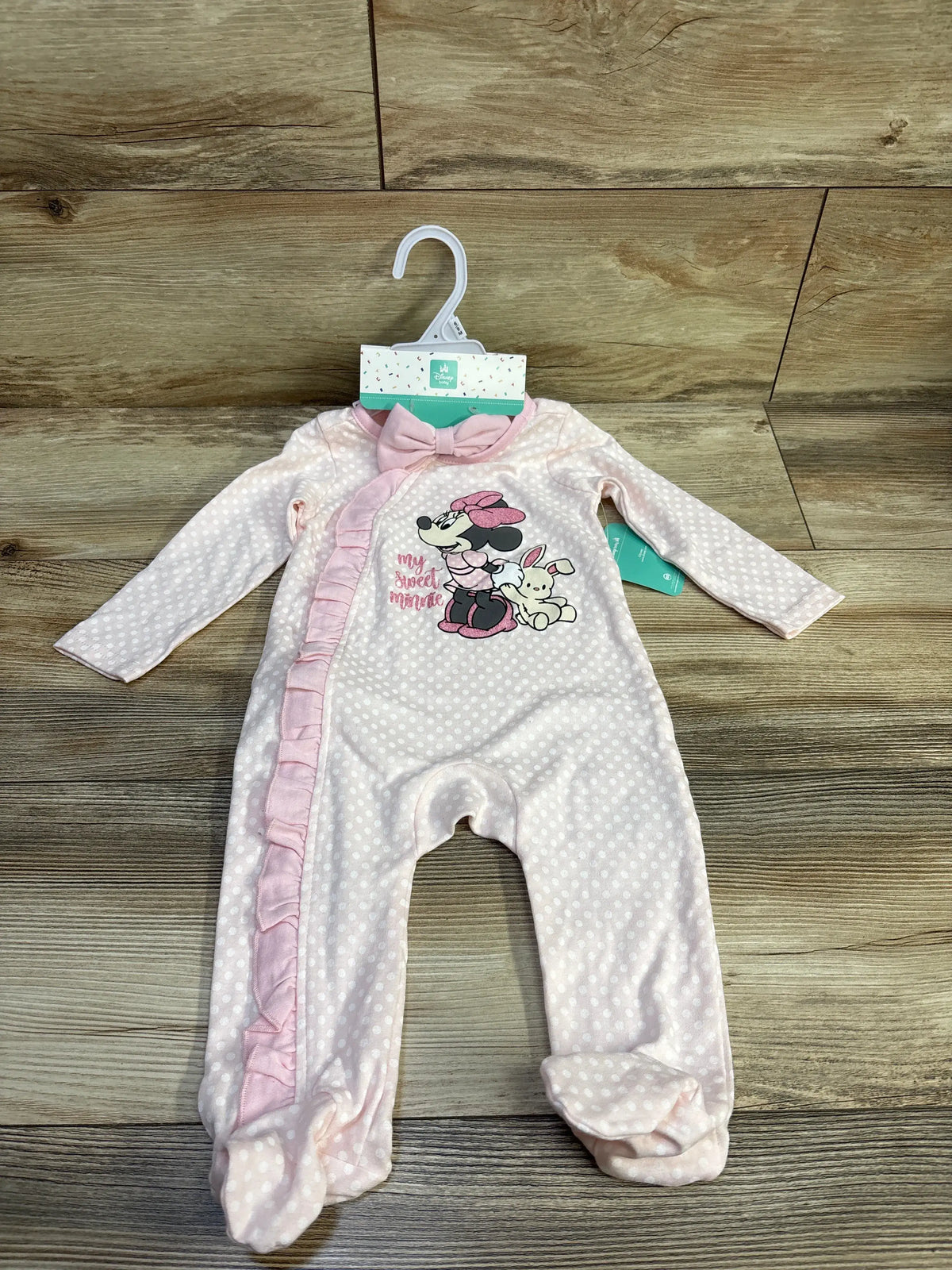 New pink Disney Minnie Mouse baby sleeper with white polka dots and ruffle detail