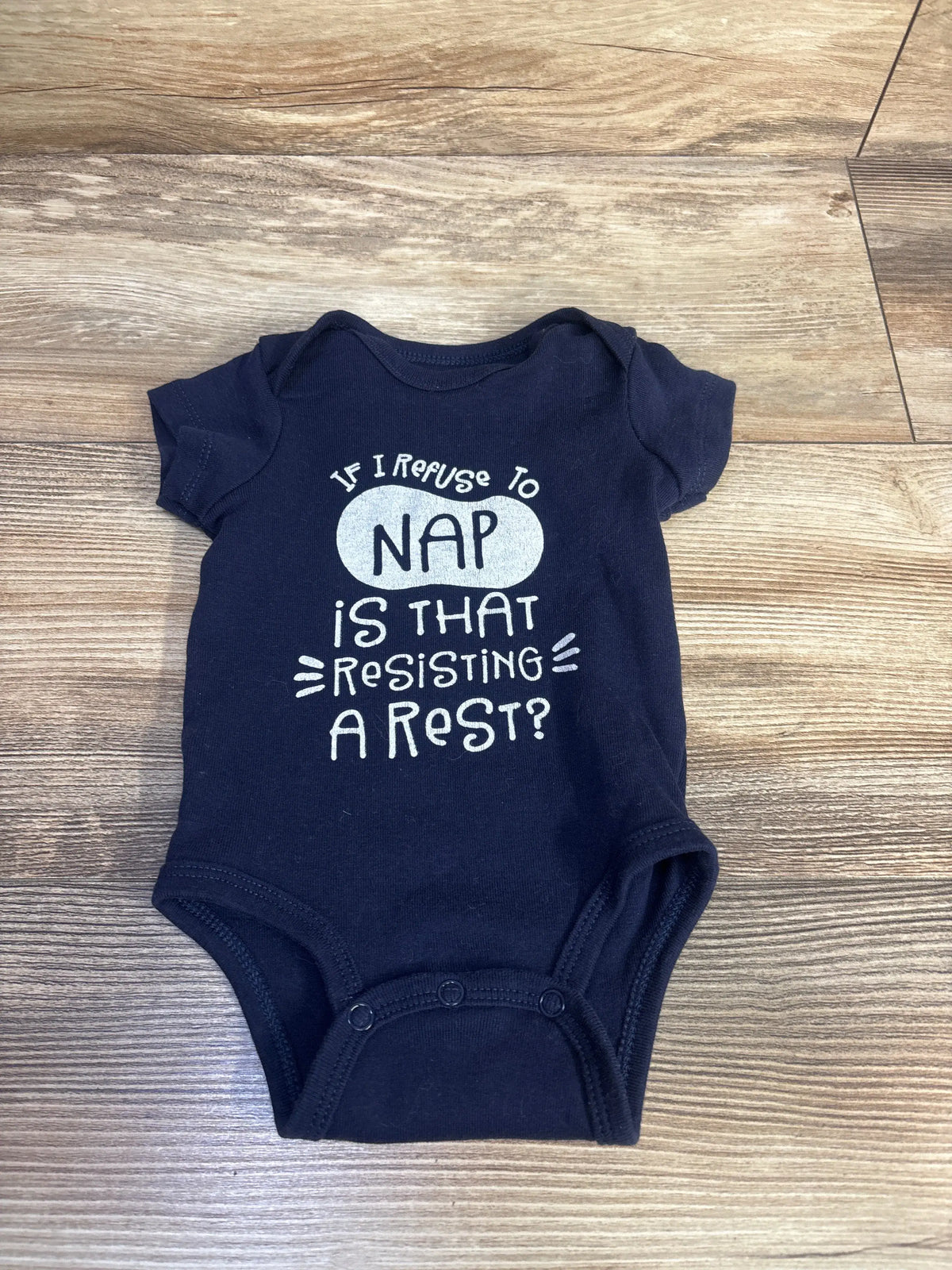 Front view of Carter’s navy bodysuit with snap closure and If I refuse to nap is that resisting a rest print