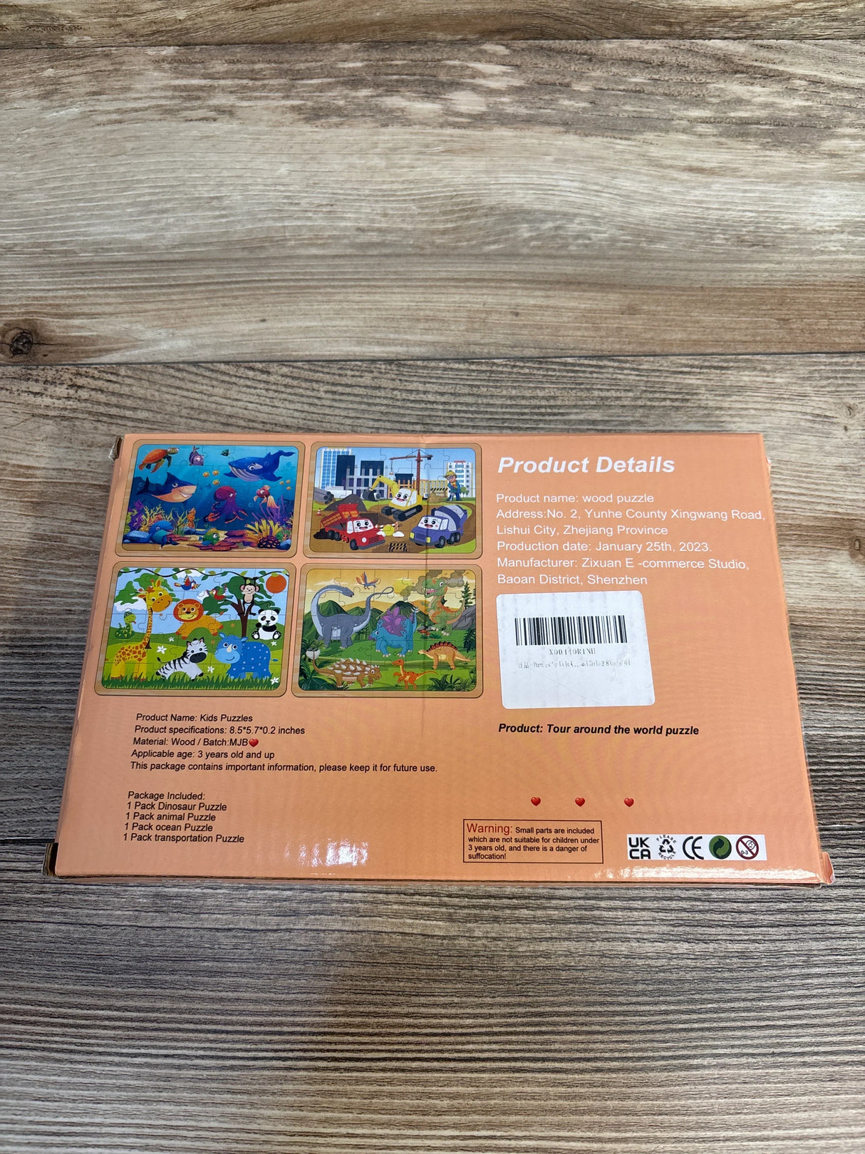 Box of wooden kids puzzles featuring ocean, transportation, animal, and dinosaur themes.