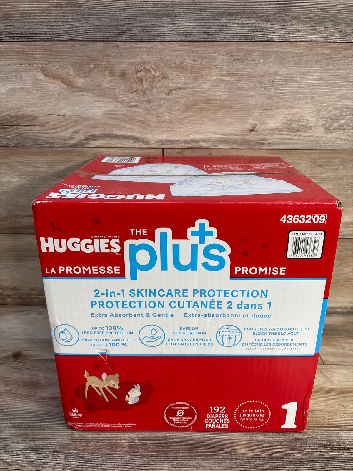 Front view of NEW Huggies Plus Little Snugglers diapers box with 192 size 1 diapers and two in one skincare protection