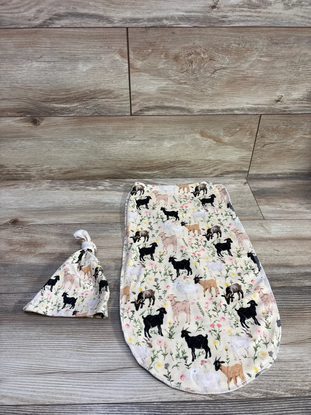 Pigsaly 2pc animal print swaddle sack and matching hat set in yellow with goat patterns
