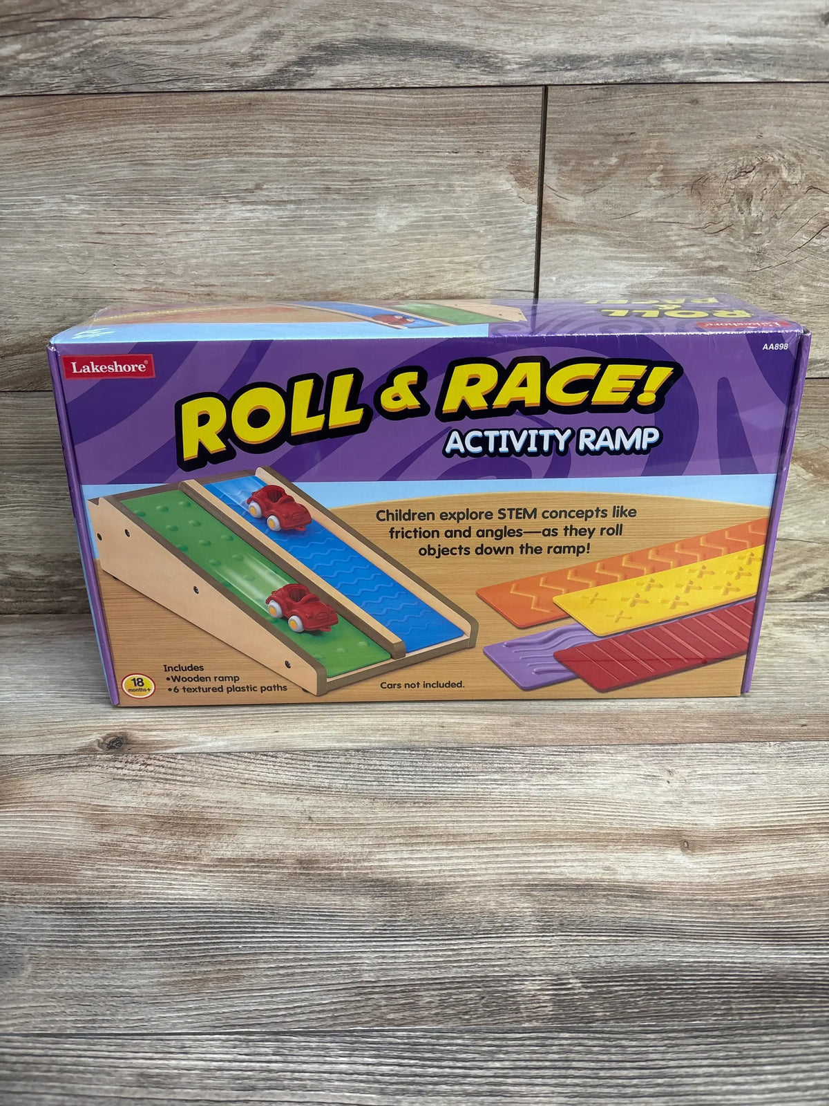 Front view of Lakeshore Roll and Race Activity Ramp box showcasing ramp illustration with textured paths on wood surface