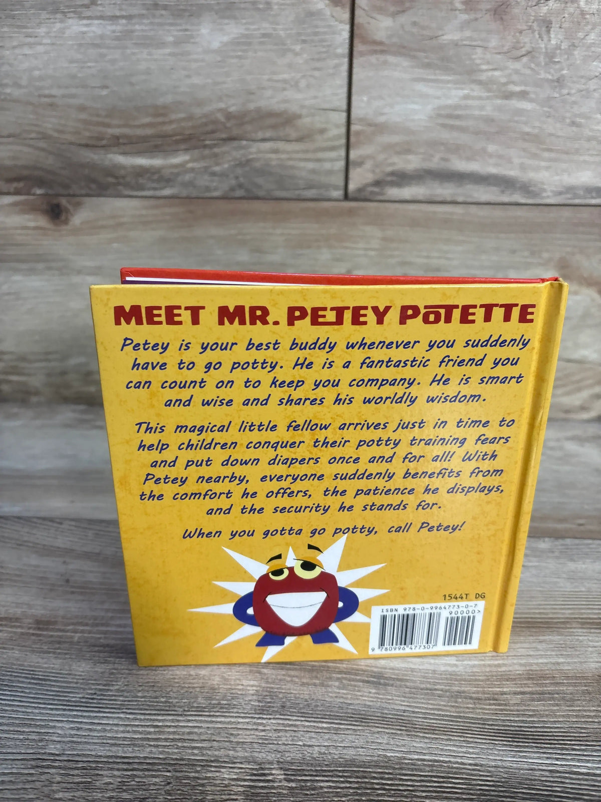 Back cover of Quest For Cloud Kingdom Hardcover Book showing Mr. Petey Potette and a potty-training message