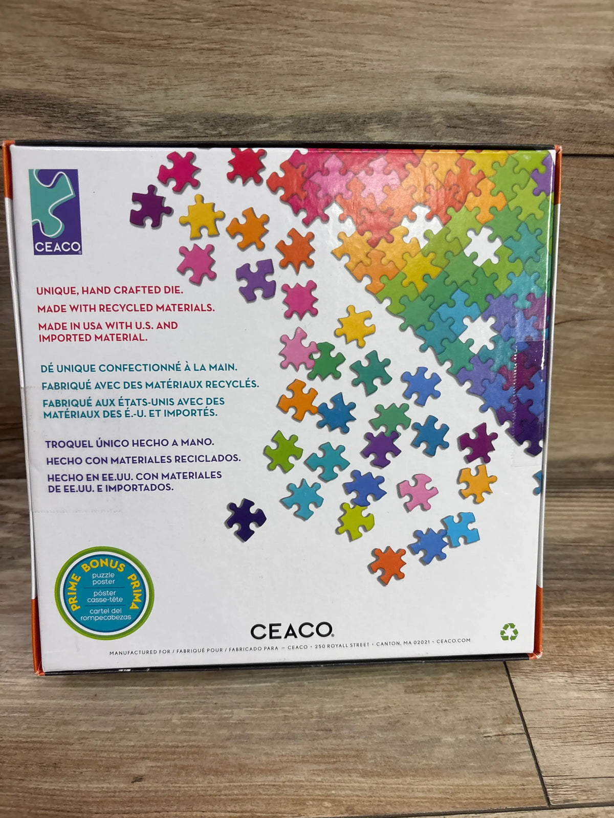 Back of Ceaco Disney Zootopia 300pc jigsaw puzzle box with colorful loose pieces and recycled materials text