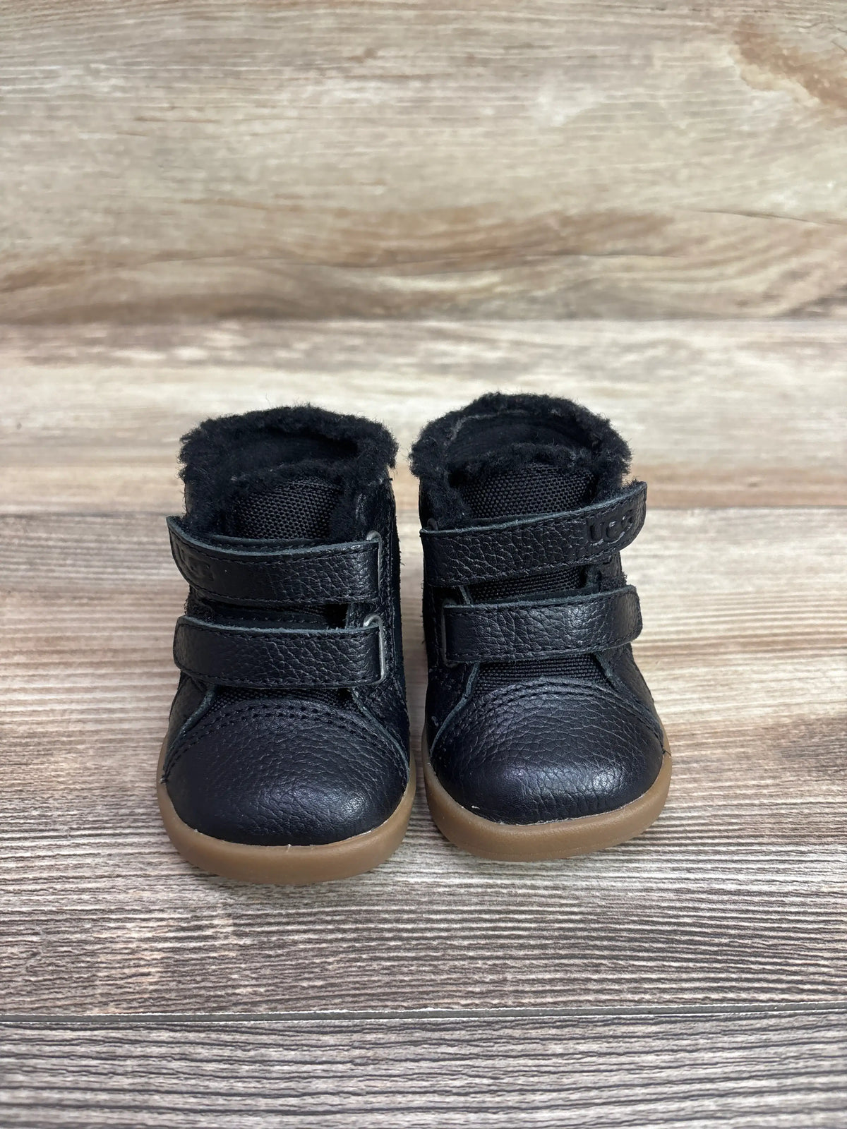 Pair of black Me n Mommy To Be Rennon II baby boots with faux fur lining and velcro straps.
