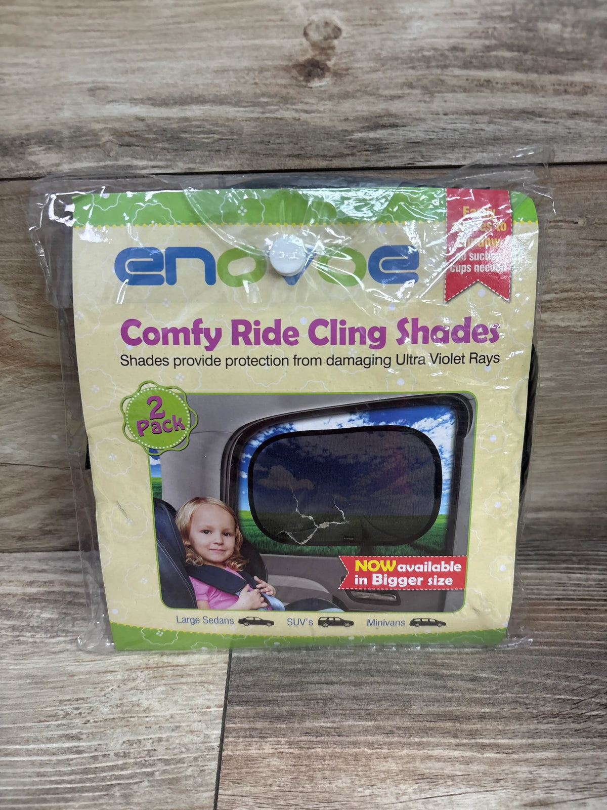 Enovoe Car Window Shade for Baby 2 pack packaging showing child in car seat
