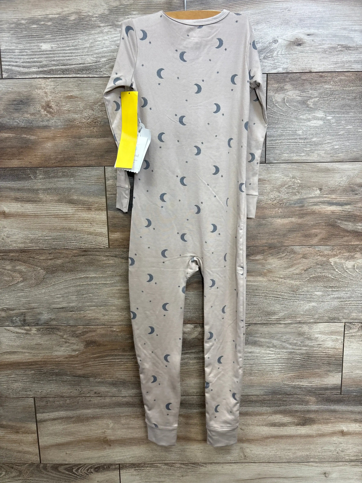 Front view of tan Cloud Island Moon Sleeper footed sleeper showing zip closure and moon print on white background