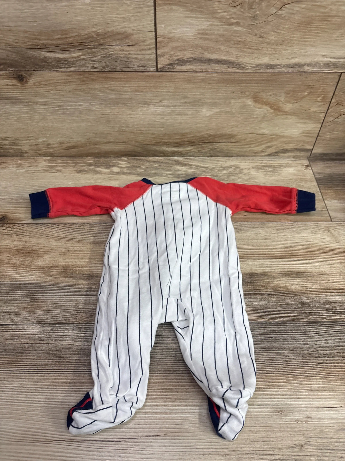 Child Of Mine white pinstripe baby sleeper with red and navy blue sleeves