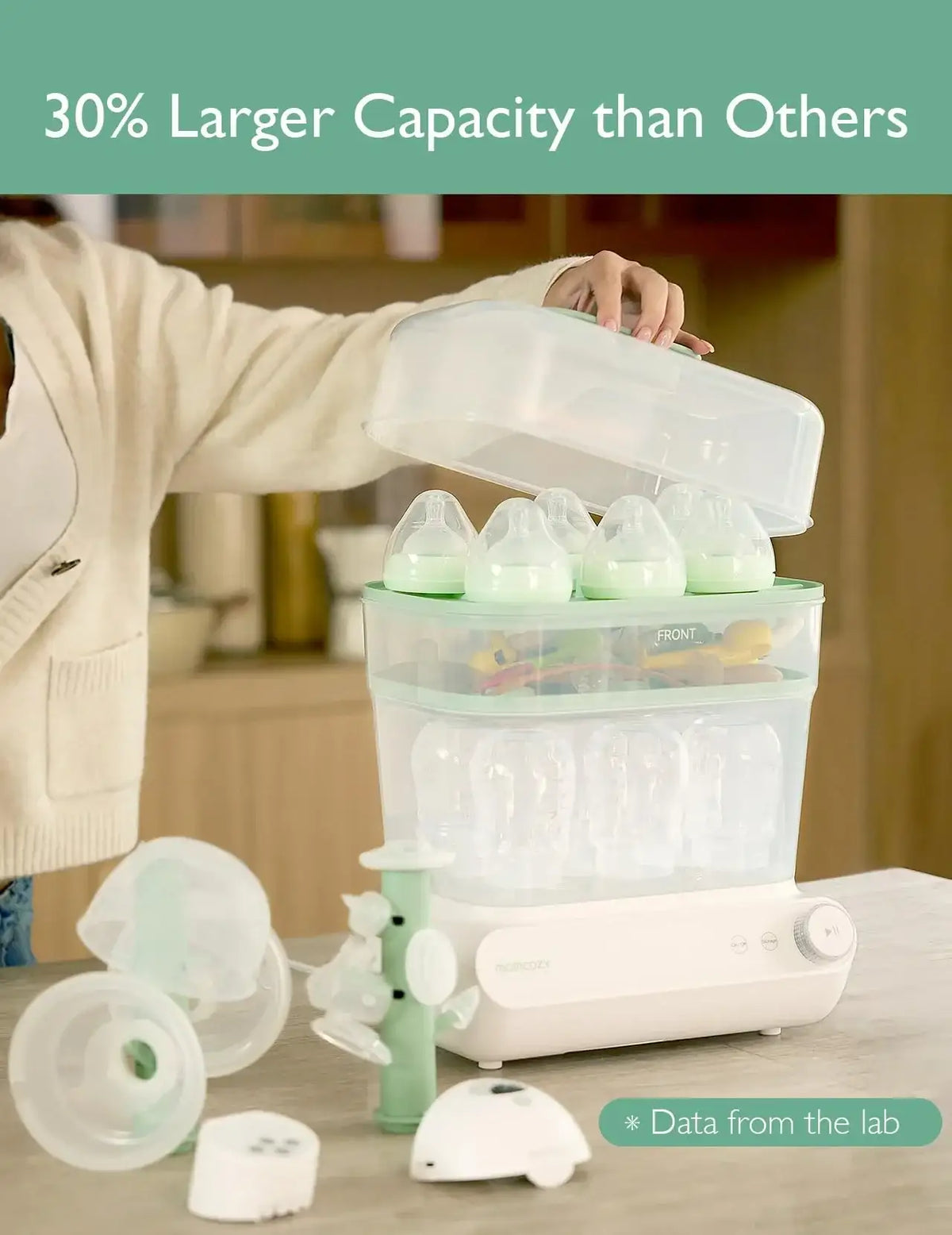 Front view of Momcozy 3-Layers Bottle Sterilizer and Dryer with lid open, bottles in three layers, and 30% larger capacity