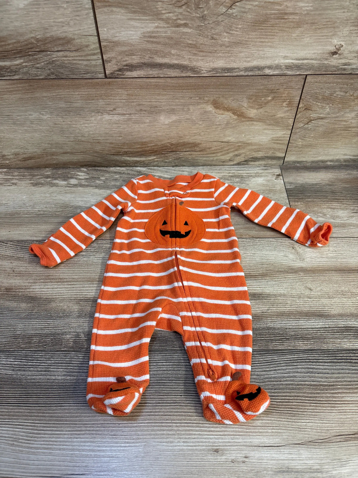 Just One You pumpkin waffle knit sleeper in orange and white stripes for newborn size