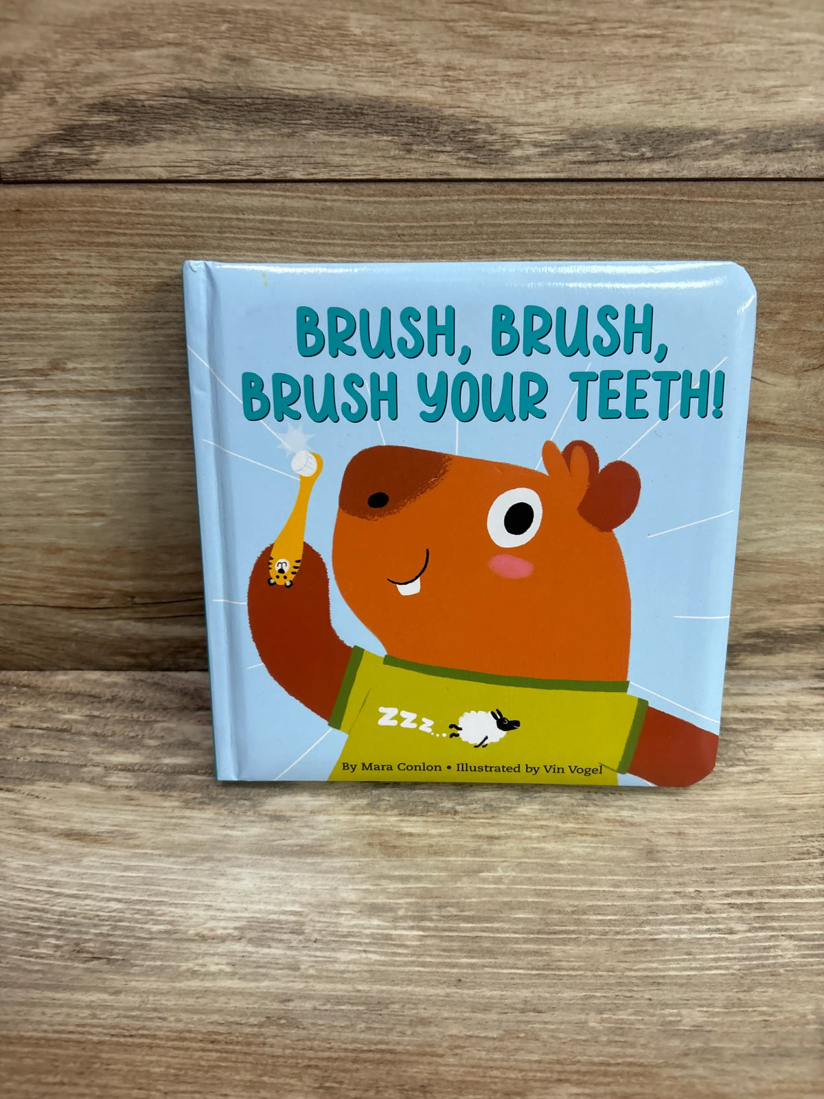 Brush, Brush, Brush Your Teeth padded board book by Me n Mommy To Be featuring a cartoon beaver.