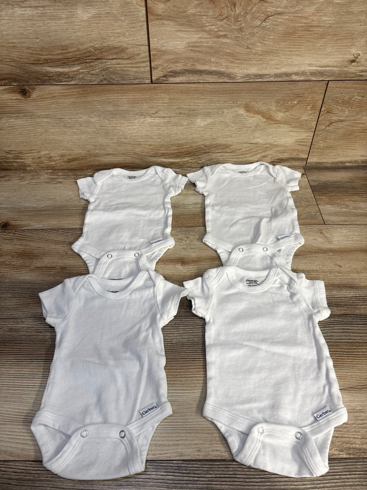Gerber 4pk Bodysuit Set White sz Newborn