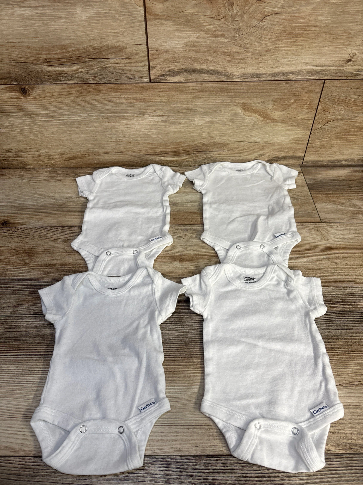 Gerber 4pk Bodysuit Set White sz Newborn