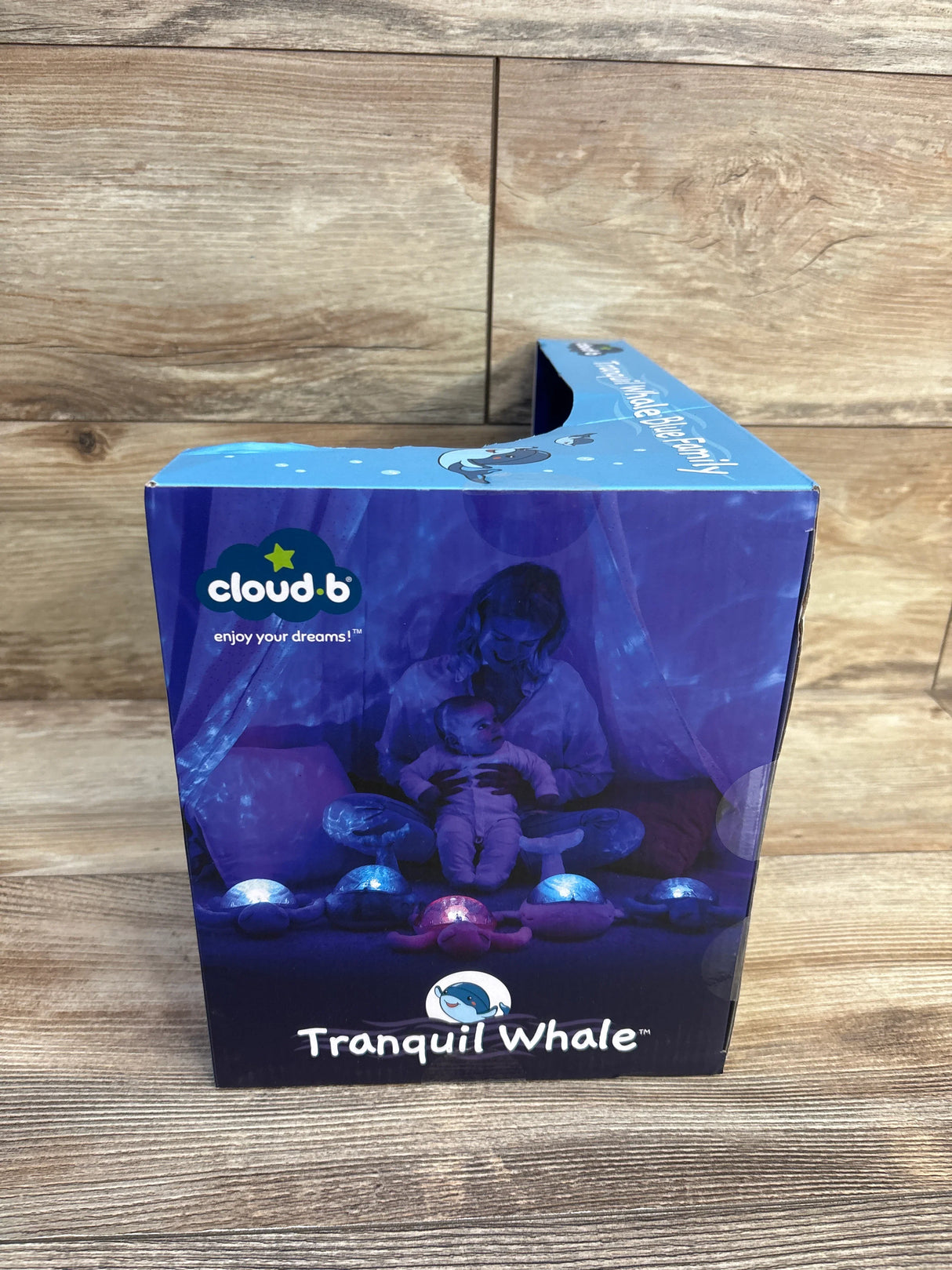Cloud b Tranquil Whale night light box for babies and toddlers on wood background