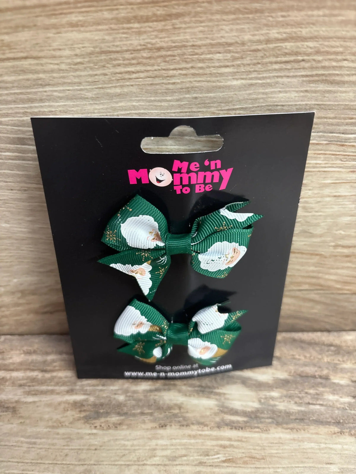Green and white floral hair bows with gold glitter, kids accessories on black card