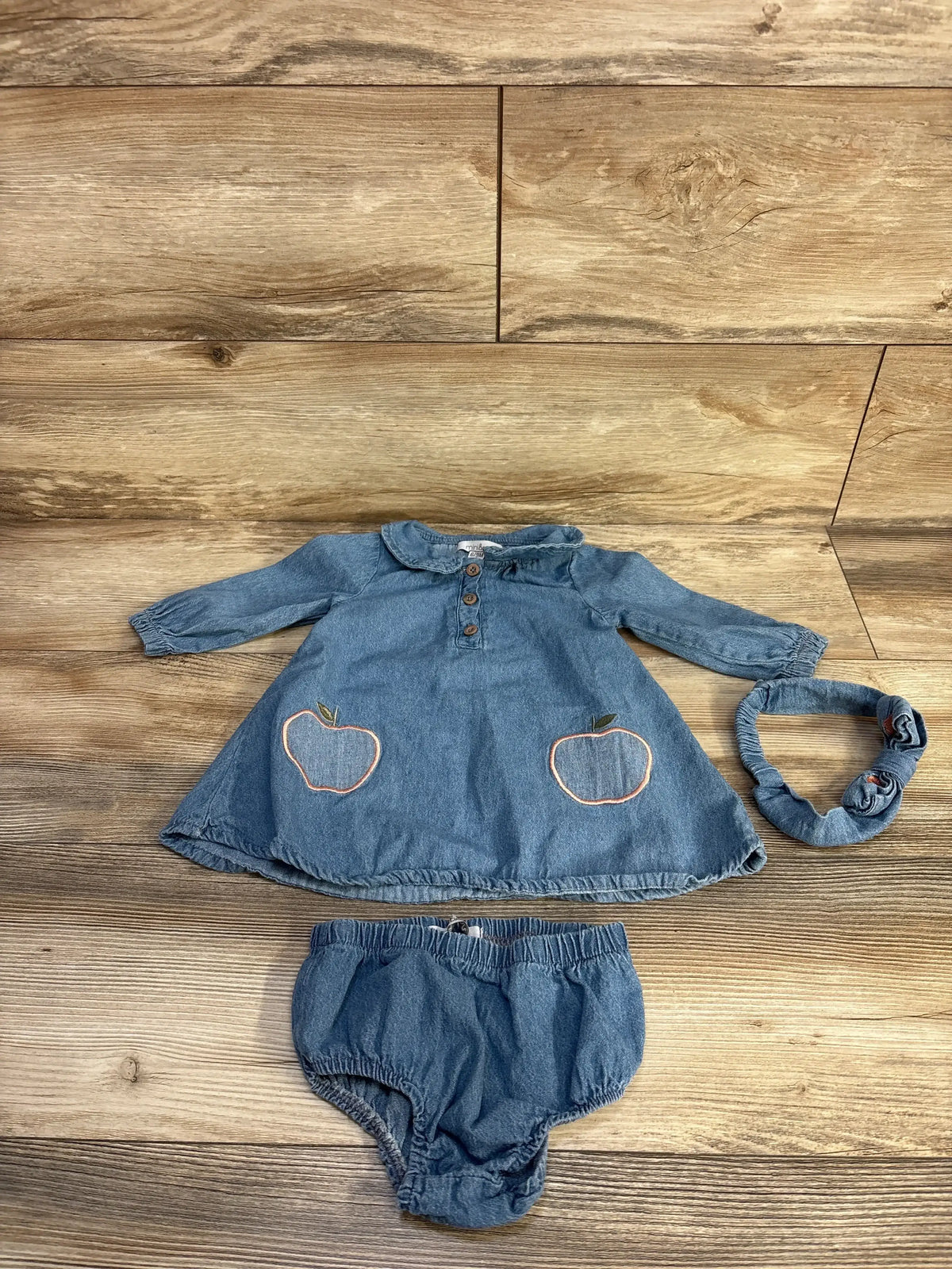 Front view of Minibean 3pc blue denim dress set, size 6/9m, with collared long-sleeve dress, bloomers and headband