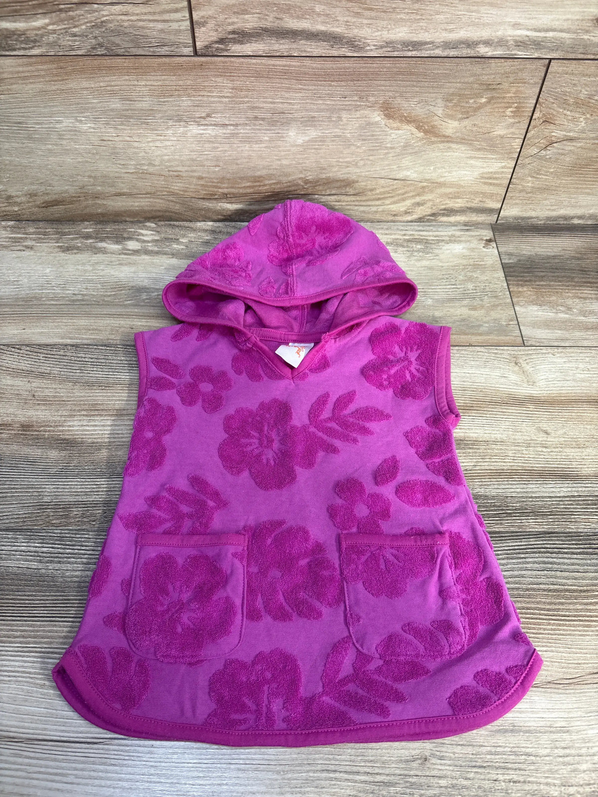 Front view of Cat & Jack purple terry cloth swim cover up, size 12 months, showing hood, floral pattern, and two front pockets