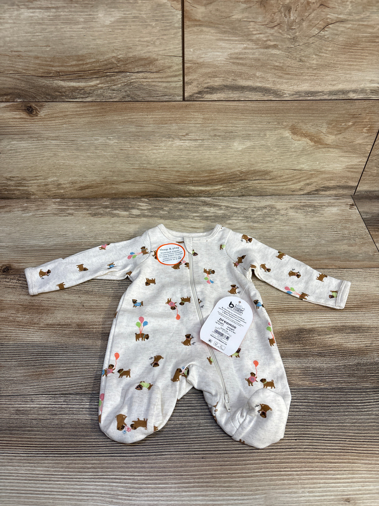 Premie baby sleeper with dog and balloon print on wood floor, long sleeve, zipper front