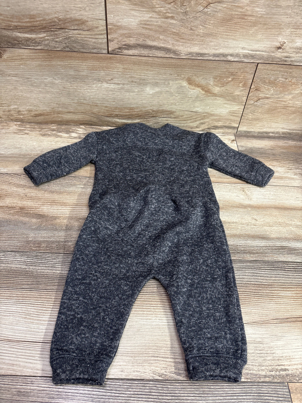Top-down view of Old Navy 2pc knit sweater and pants set in grey, showcasing long sleeves and cuffed legs on a wood floor