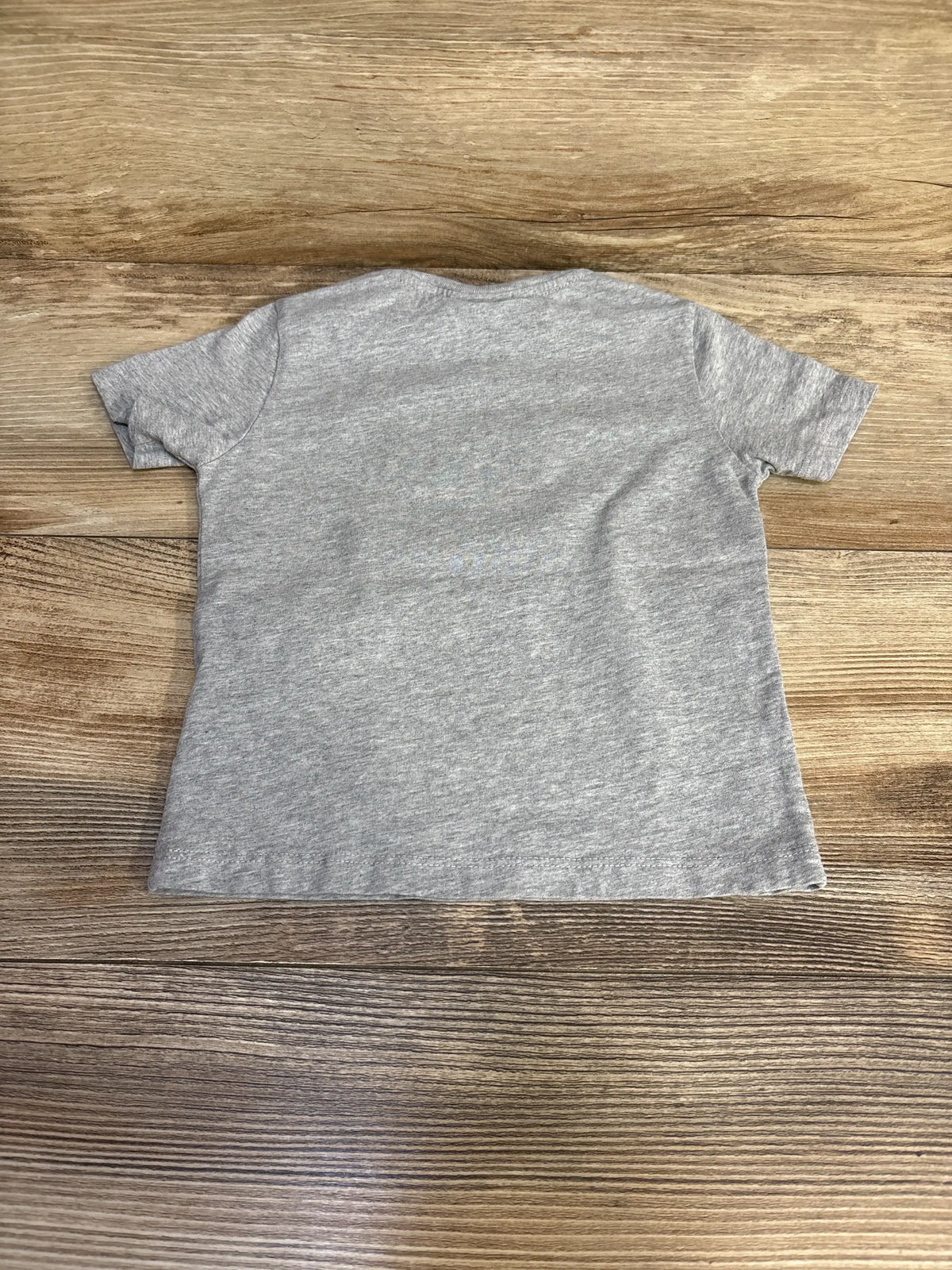 Back view of Fendi logo grey toddler T-shirt showcasing plain heathered back and short sleeves on wooden background