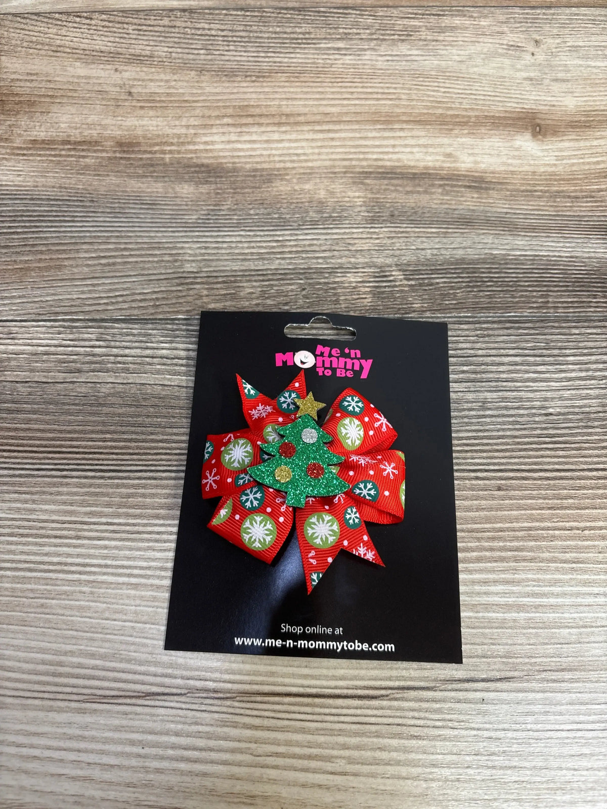 Festive red bow with snowflakes and glitter Christmas tree for kids, perfect holiday accessory