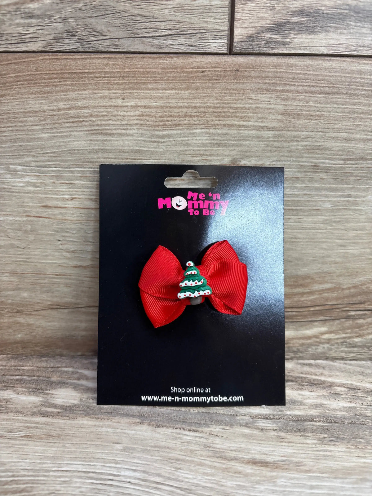 Red ribbon bow with Christmas tree charm, kids holiday hair accessory on black card
