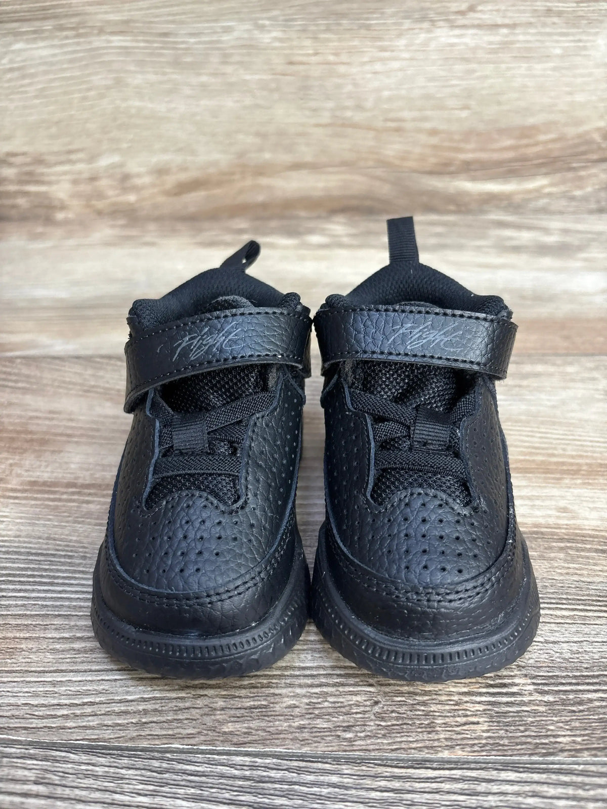 Front view of Air Jordan Max Aura 5 TD Black Anthracite sneakers with perforated uppers and lace closure