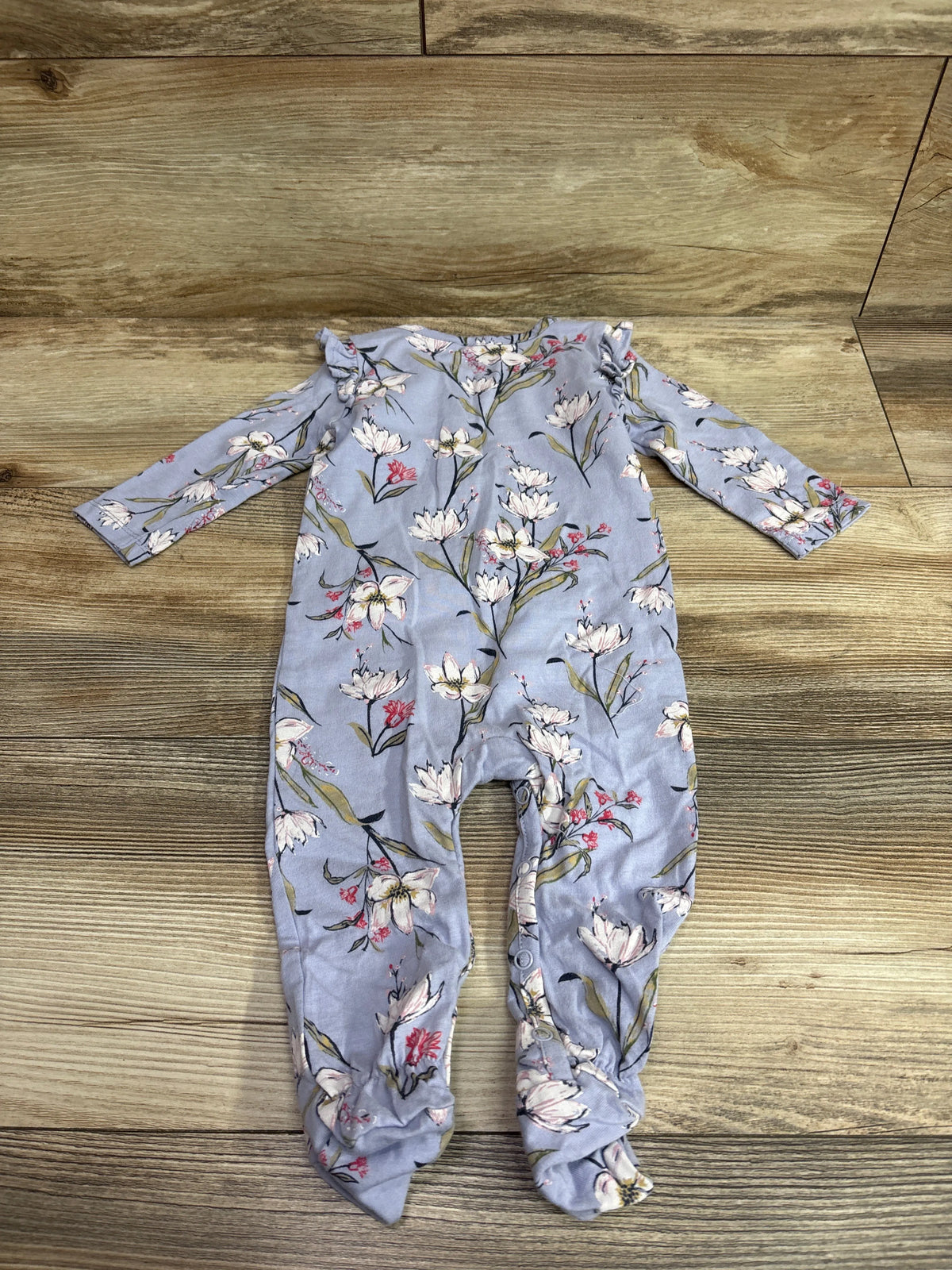 Jessica Simpson lilac footed coverall for babies with a white and pink floral print