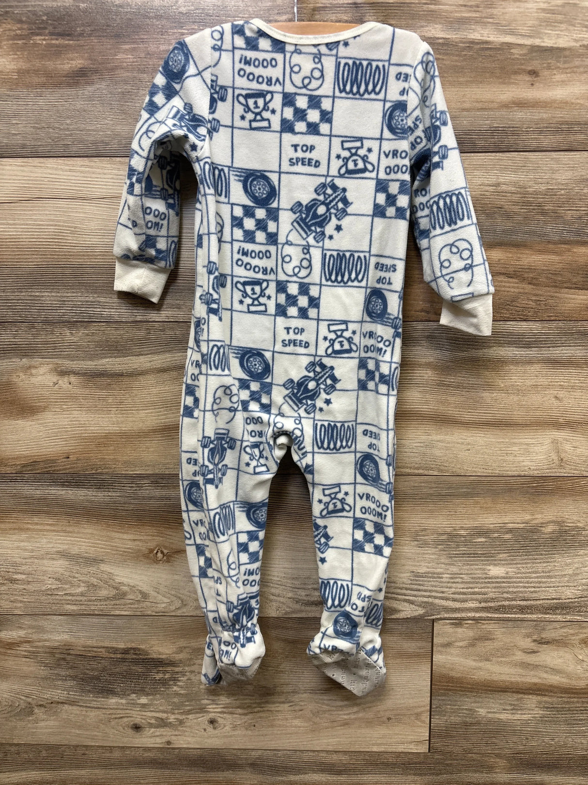 Back view of Kids Headquarters race car blanket sleeper in ivory with blue race car ‘Top Speed’ print, footed with non-slip soles