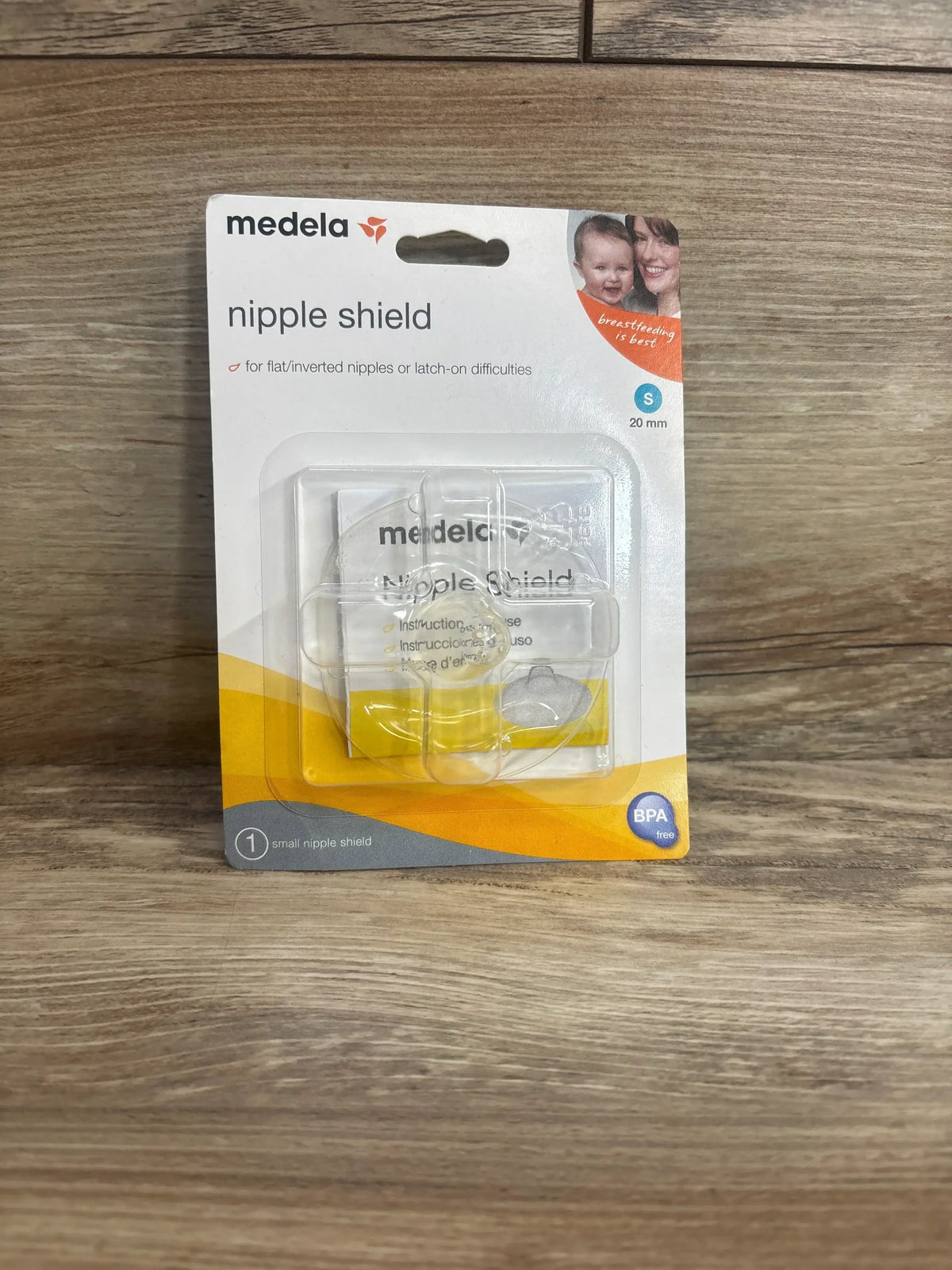 Front view of Medela Contact 20mm nipple shield in blister pack showing silicone shield and BPA free badge