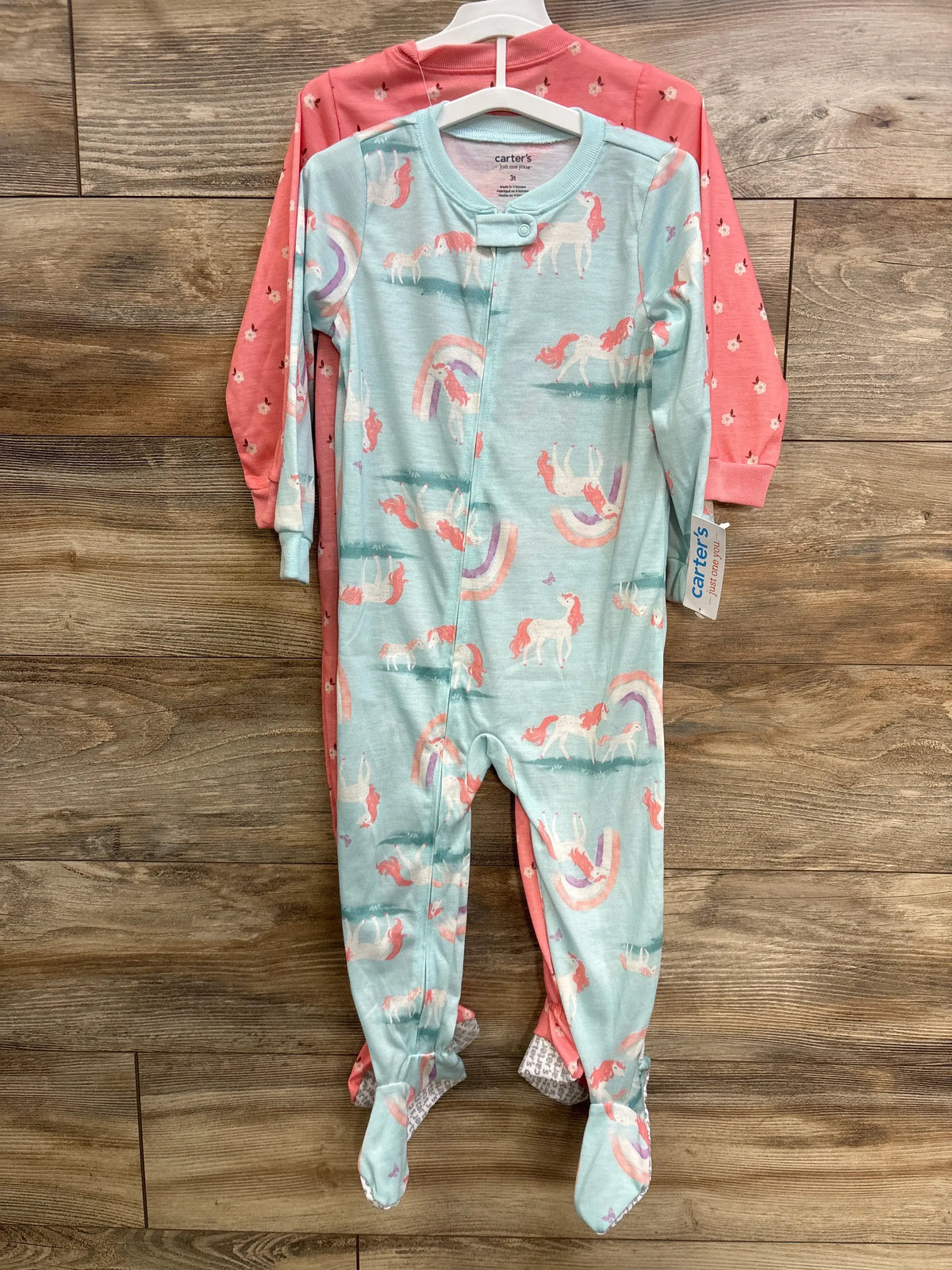 Two Just One You unicorn print footie sleepers in light blue and pink, size 3T.