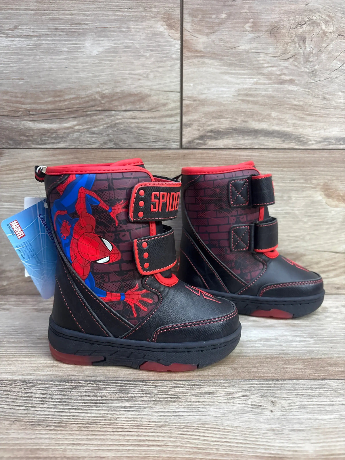 Kids Spider-Man winter boots with red and black design and Velcro straps