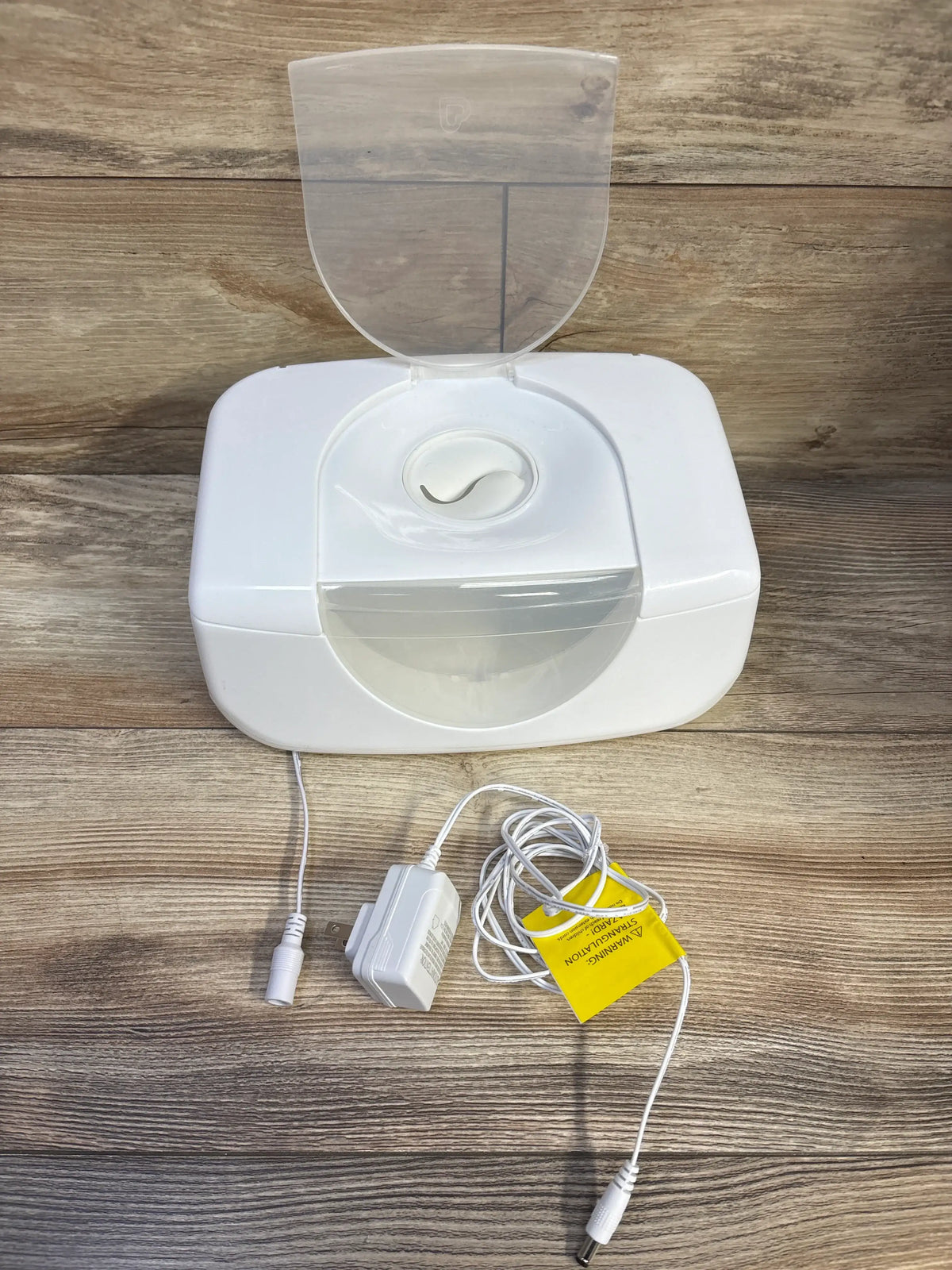 White Me 'n Mommy To Be Bright & Warm Wipe Warmer with power cord on wood background
