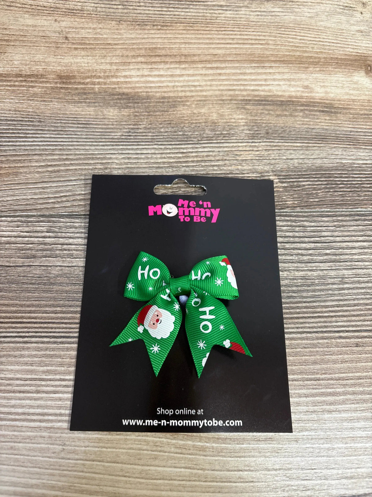 Green Christmas bow with Santa and 'Ho Ho Ho' print, festive kids hair accessory
