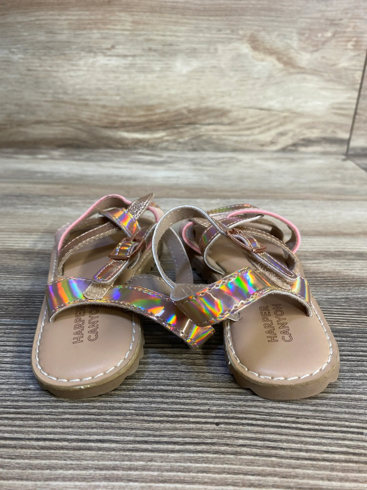 Kids' iridescent sandals with velcro straps on wooden background, Harper Canyon brand