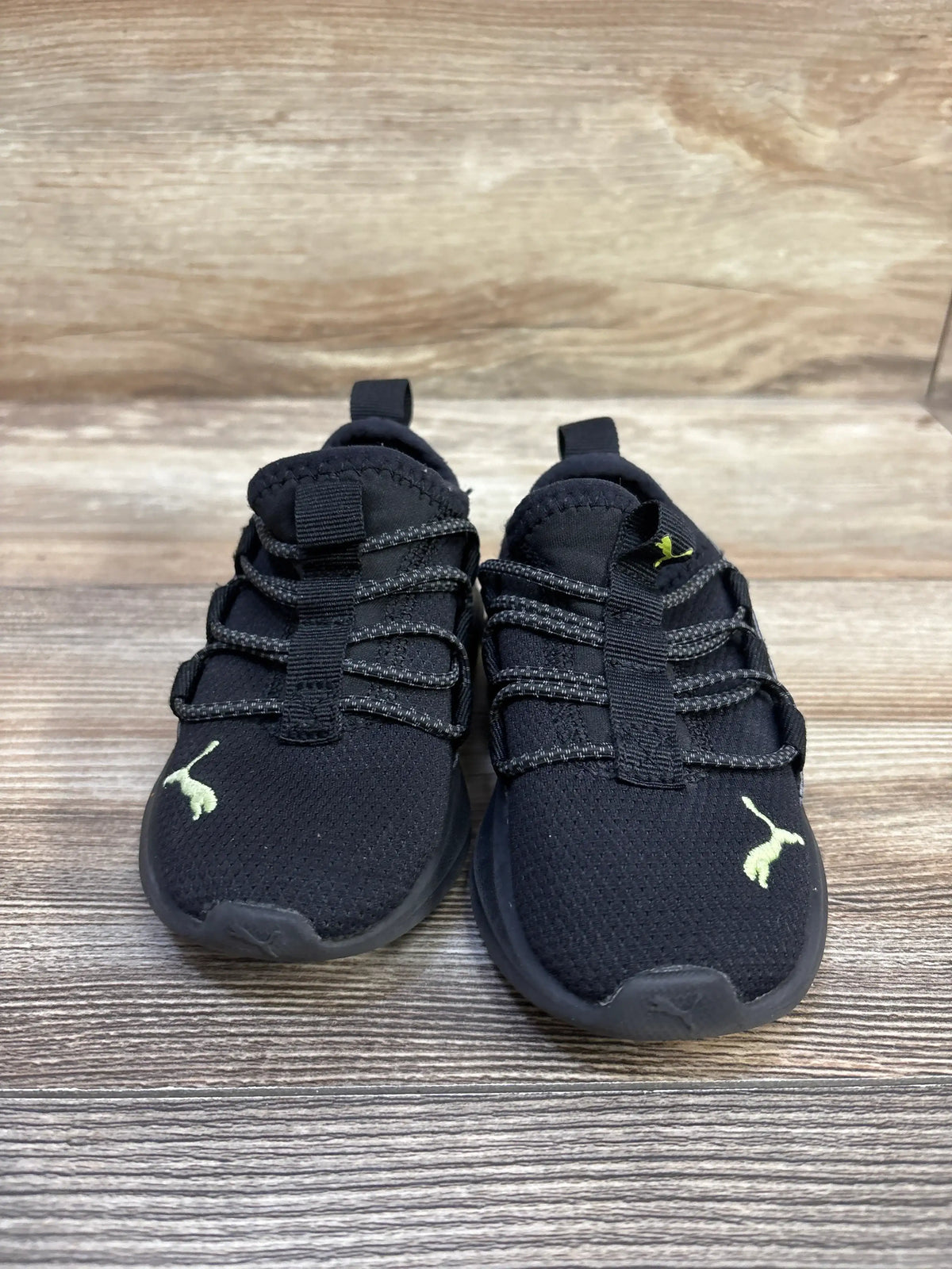 Pair of black Me n Mommy To Be Puma One4All slip-on shoes for kids size 6c