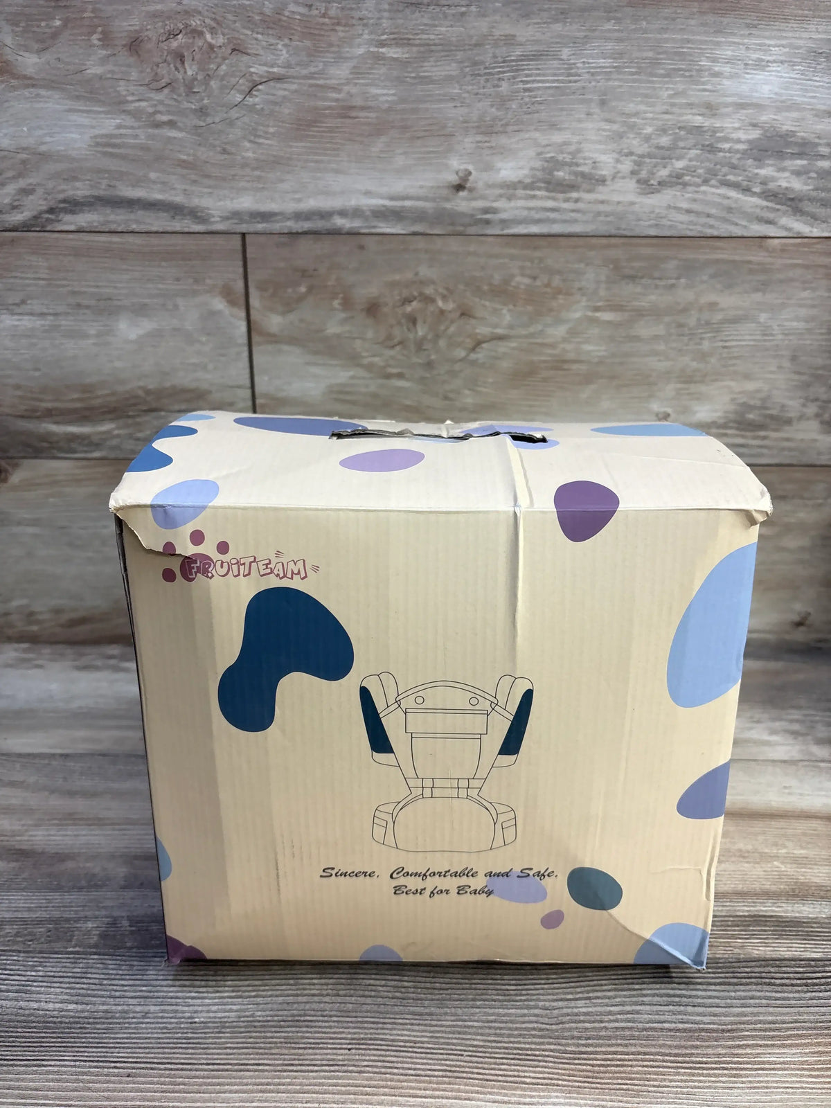 Packaging for a Me n Mommy To Be FRUITEAM 6-in-1 Baby Carrier with Hip Seat in Blue