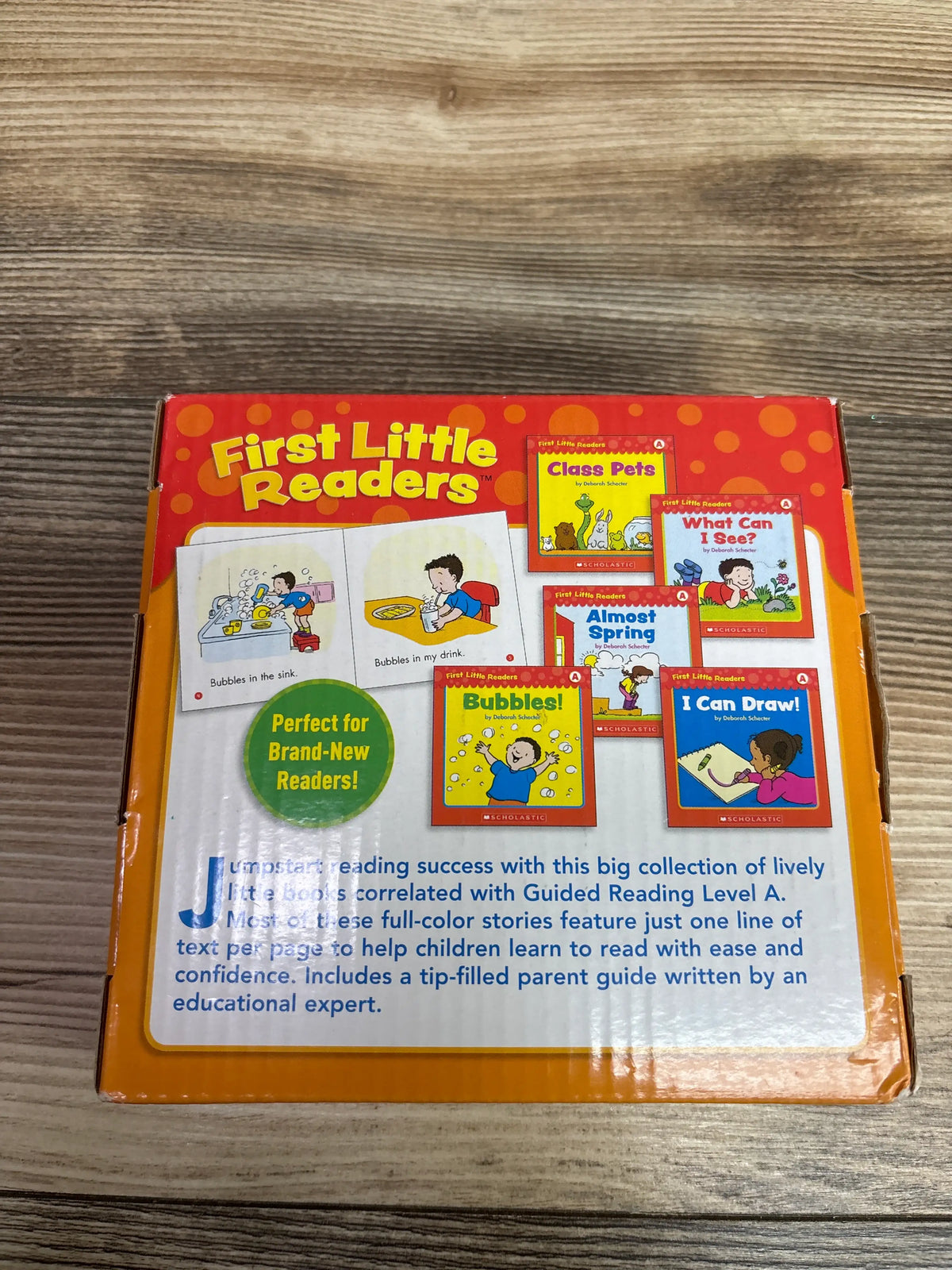 Rear packaging of First Little Readers Level A book set showing colorful paperback readers and a parent guide