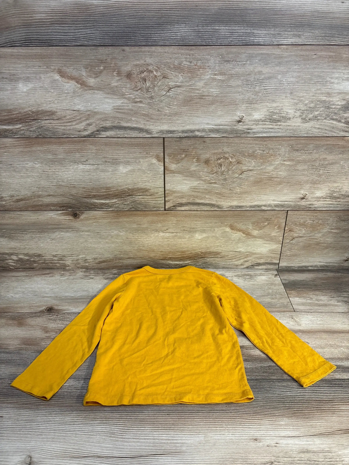 Back view of Children's Place Little Dude Bright Future yellow long-sleeve toddler shirt, size 4T on wood floor