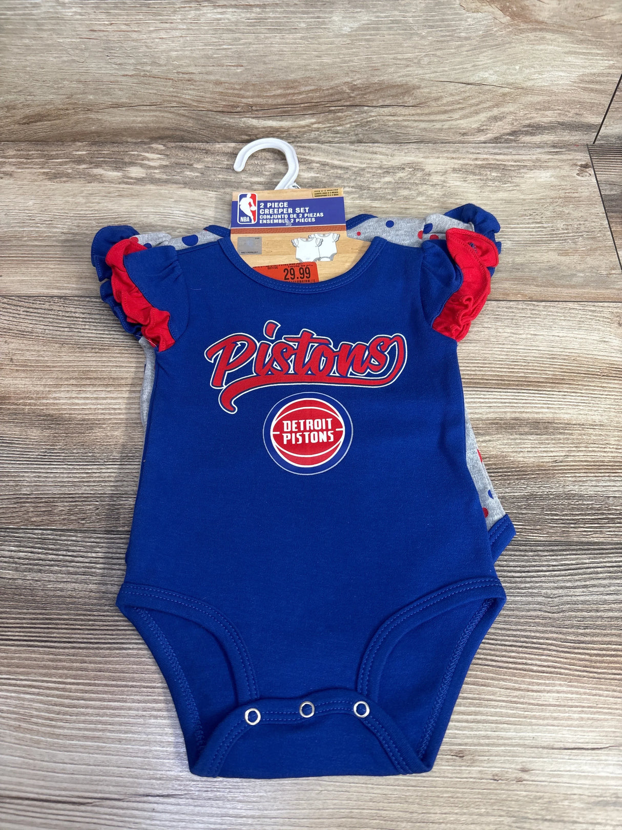 Detroit Pistons baby bodysuit set, blue and red, NBA infant apparel on hanger