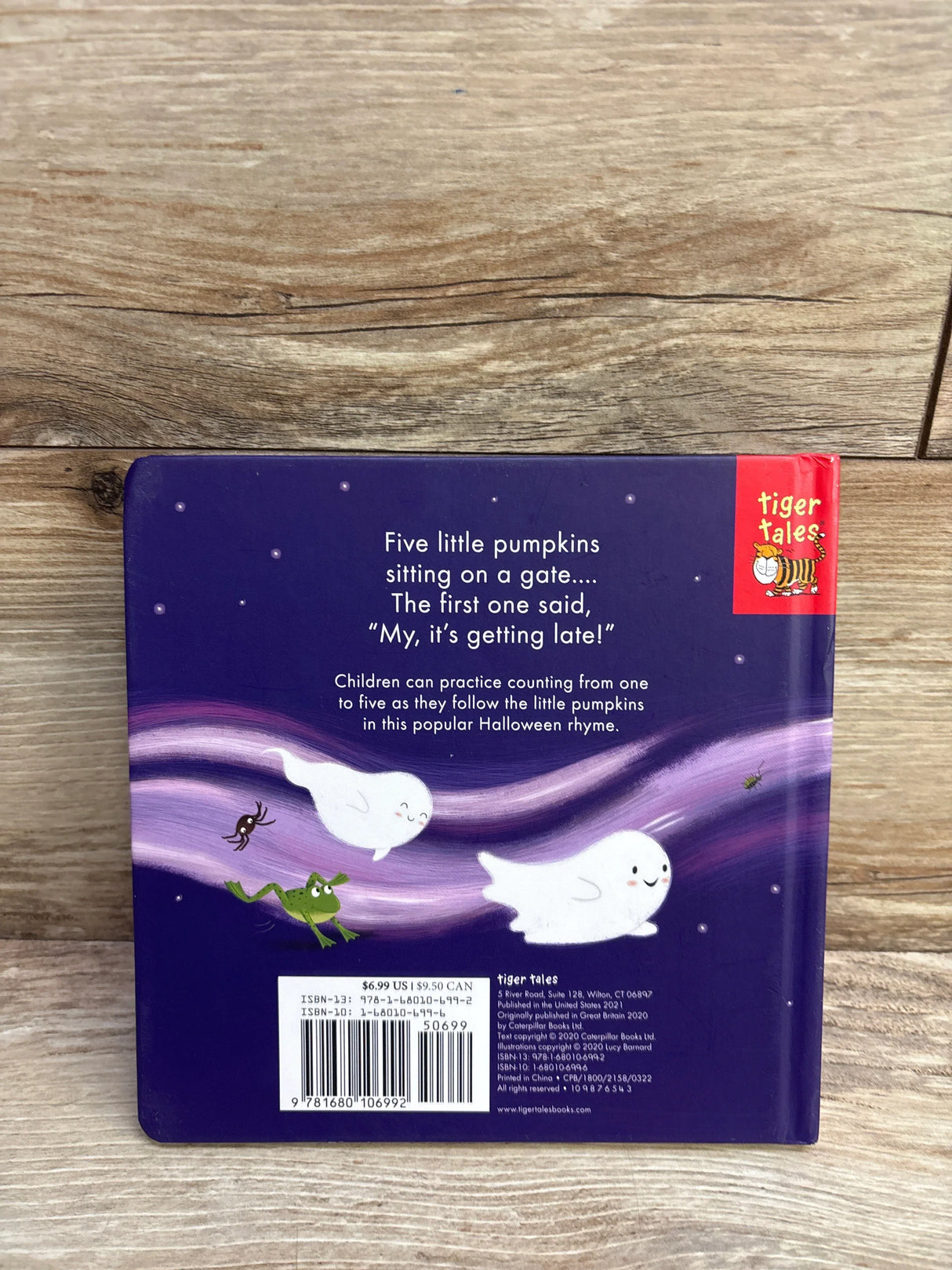 Back cover of 'Five Little Pumpkins' children's book with ghosts, frog, spider; Halloween counting rhyme by Tiger Tales