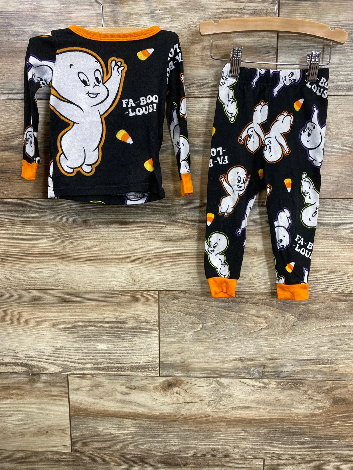 Kids Halloween pajama set with Casper the Friendly Ghost and candy corn print, black with orange trim
