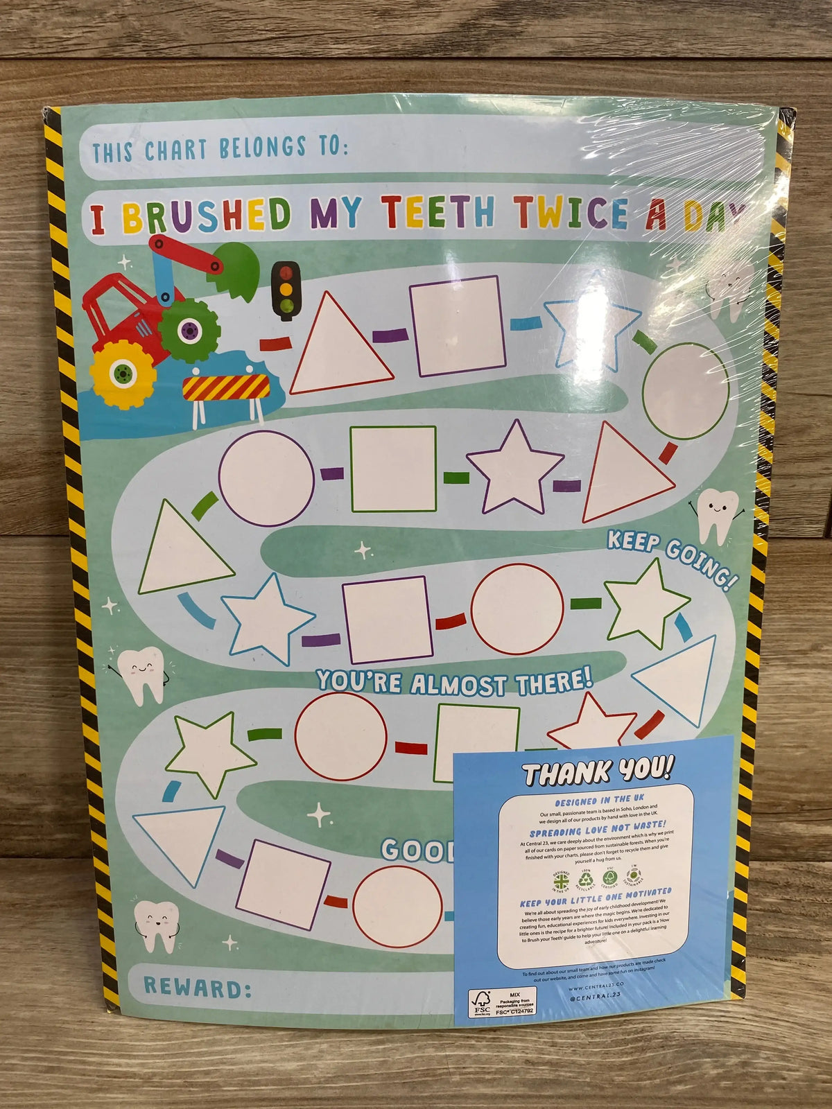 Front view of kids teeth-brushing reward chart with headline ‘I brushed my teeth twice a day’, colorful path and reward box